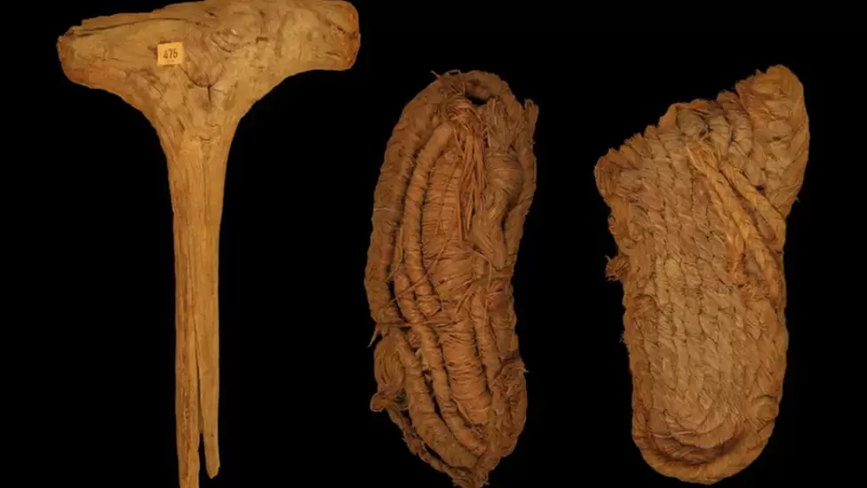Scientists Discover Europe's Oldest Shoes: 6,000-Year-Old Sandals Woven from Grass - Wooden mallet and fragments of grass sandals